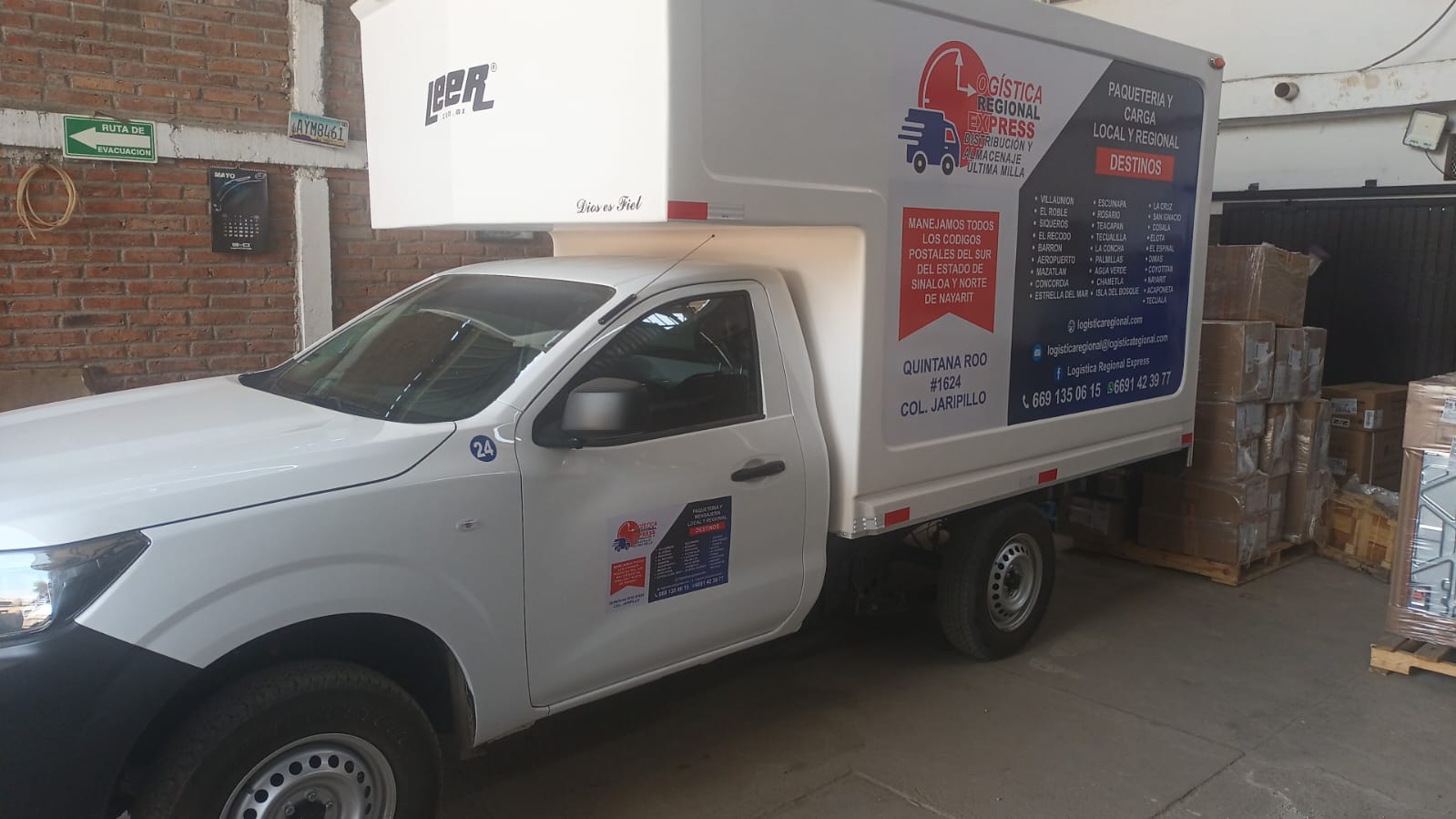 brown cardboard boxes on black plastic crate